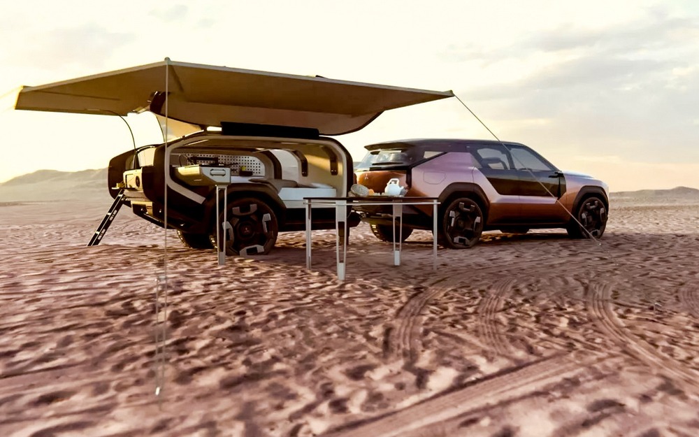 Вместе с машиной представили прицеп-кемпер, выполненный в том же стиле. В нем есть двуспальная кровать, мини-кухня и внешний душ.